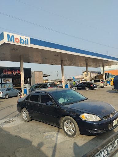 Mobil Filling Station, Aguda