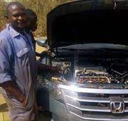 Johnx-Autobay Diagnostic Center